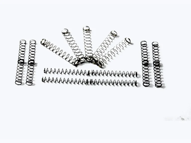 Automotive spring product assortment for starters generators and shock absorbers
