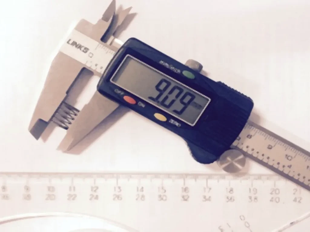 Digital caliper inspection of spring parts