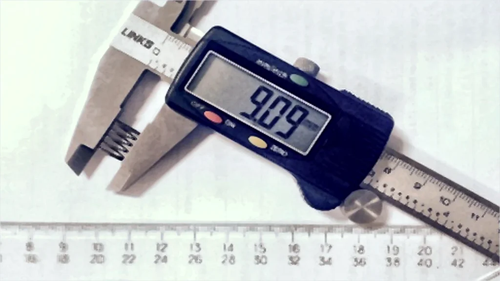 Digital caliper inspection for spring dimension control