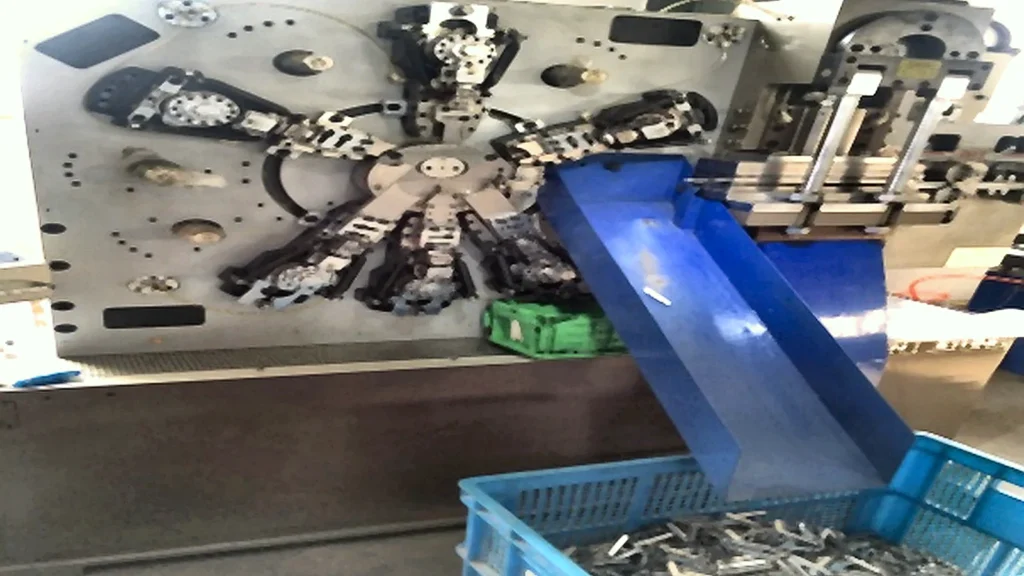 Stamping workstation for small stamped spring components